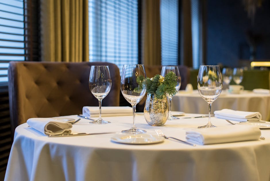 Sophisticated dining setup with polished wine glasses.