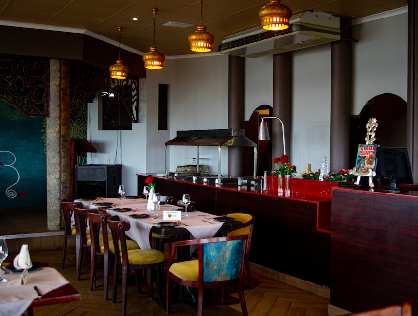 Cozy dining room with stylish decor and ambient lighting.