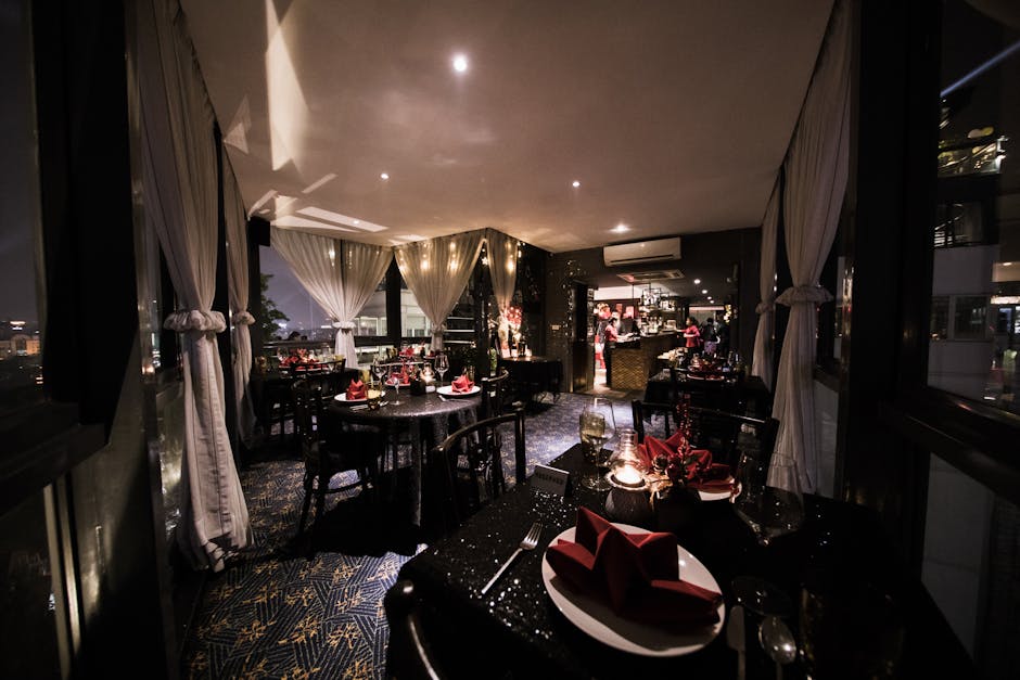A beautifully set dining room with elegant decor and a cozy ambiance.